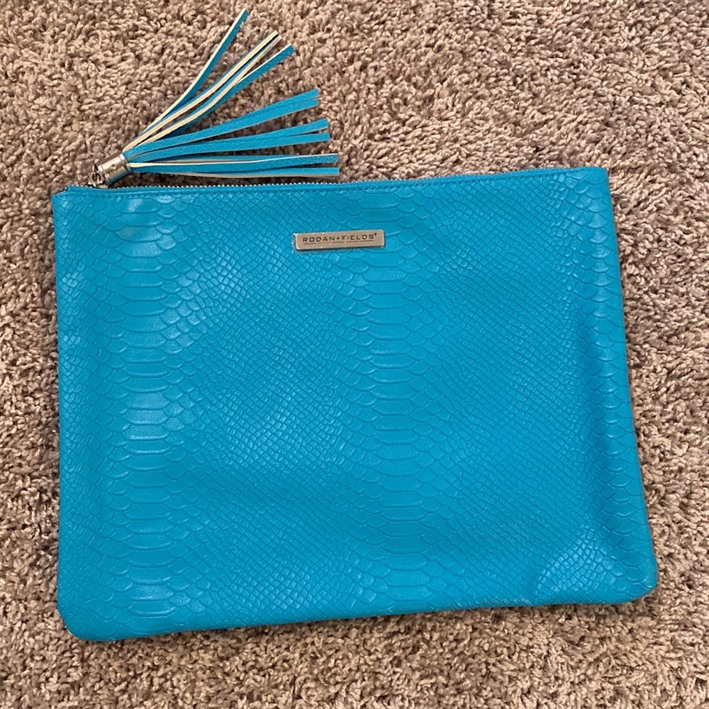 Rodan + Fields Turquoise clutch - large